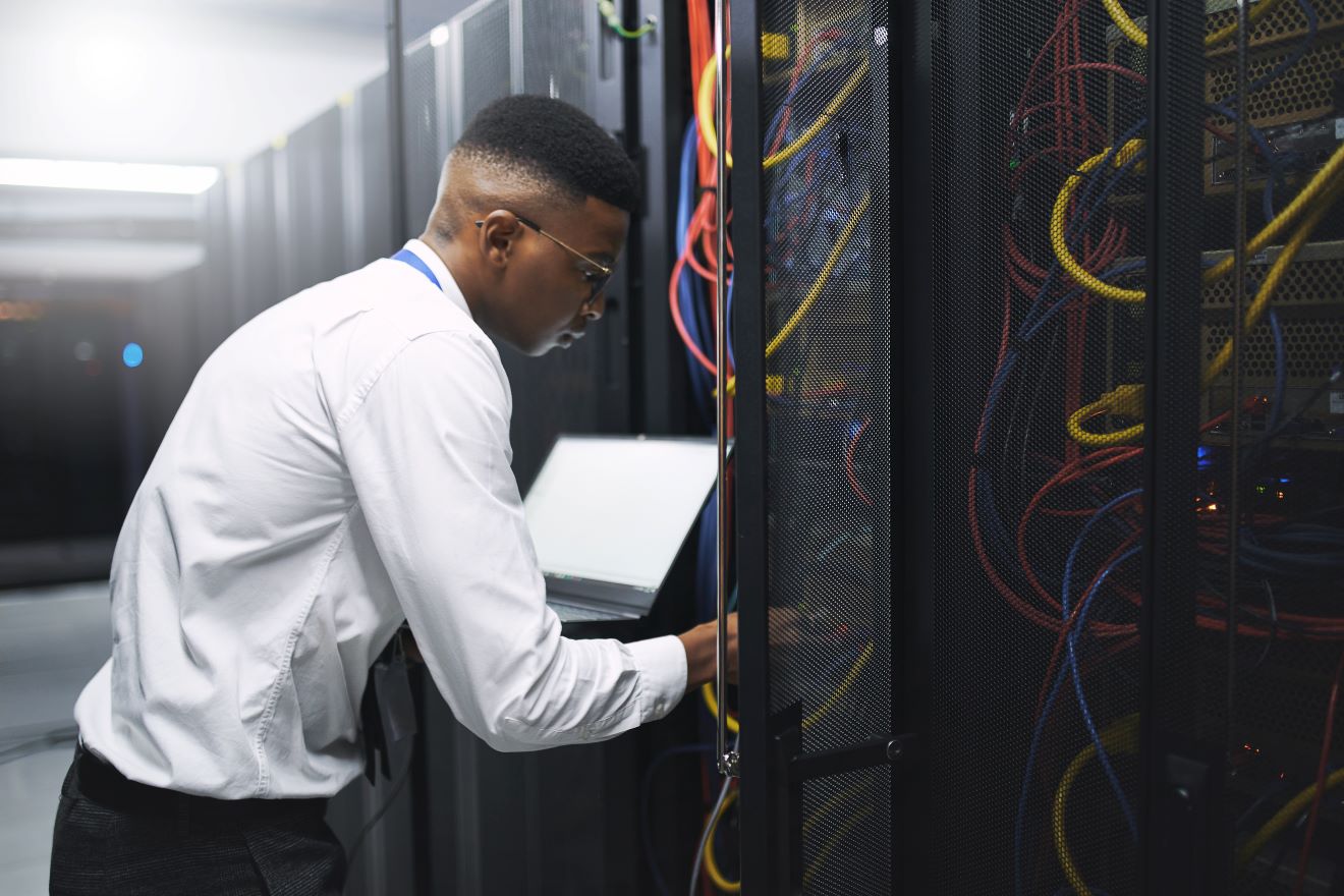 IT support technician working to fix an IT issue